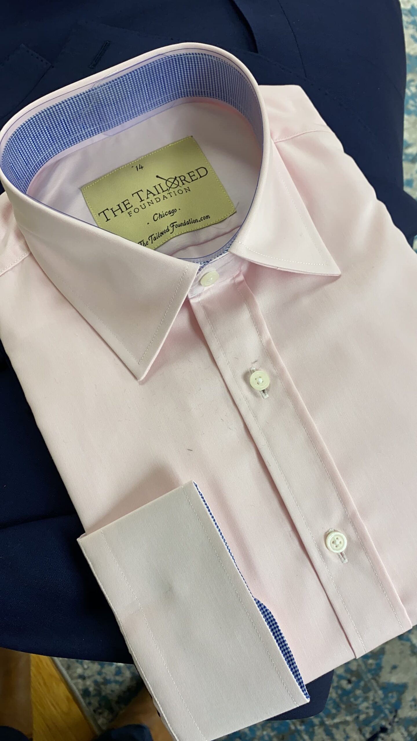 Pale pink handcrafted shirt with The Tailored Foundation collar label
