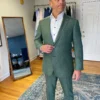 A man wearing a tailored suit