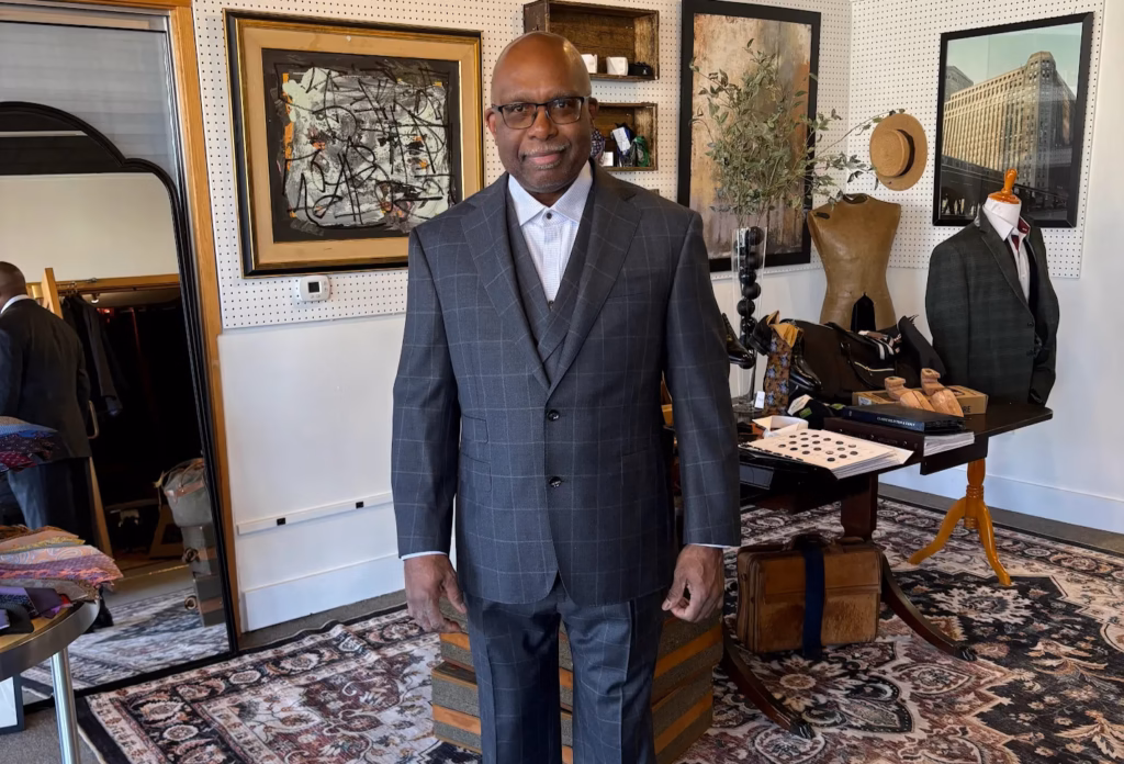 A man wearing a custom suit from the Tailored foundation